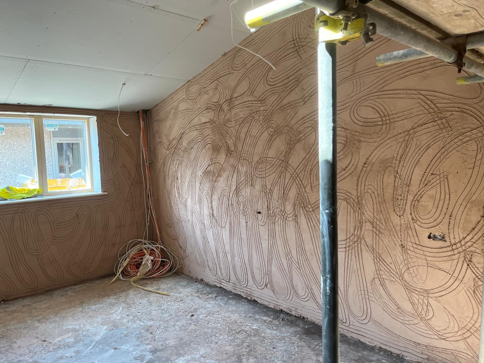 Preparing walls with plaster